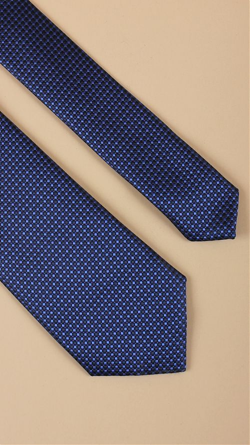 Фото Мужской галстук темно-синего цвета с мелким рисунком