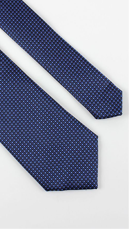 Фото Мужской галстук темно-синего цвета с мелким рисунком